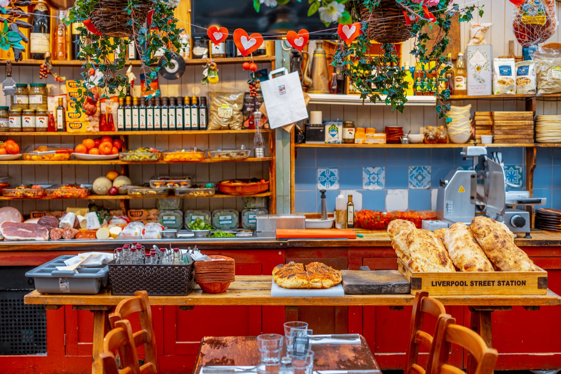 The Saporitalia deli counter — cured meats, oils and fresh bread
