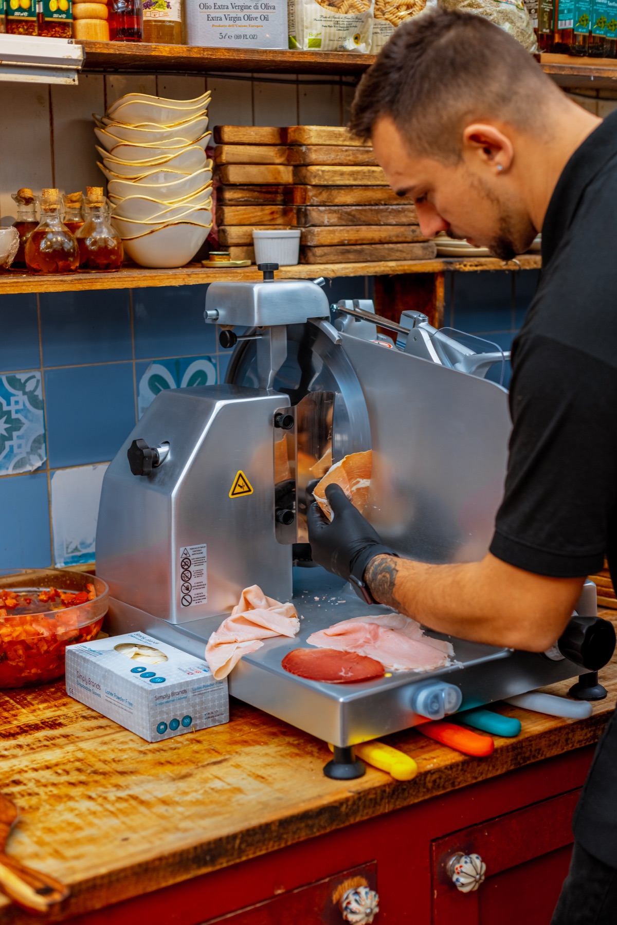 A Saporitalia chef at the deli counter